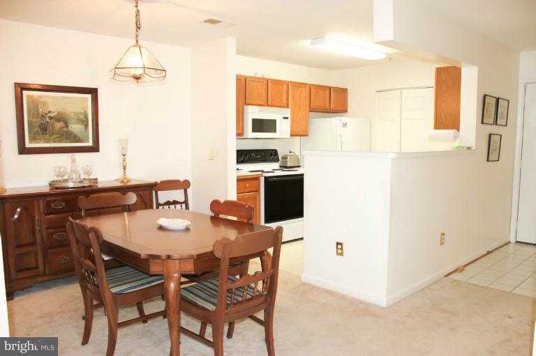 14154 Cuddy Loop, Unit 101 Woodbridge, VA 22193 - Photo 1 of 9 Dining Room