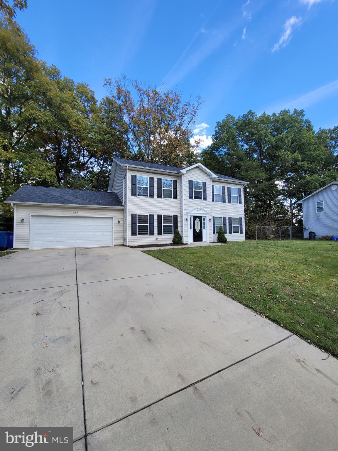 141 Jefferson Road Waldorf, MD 20602 - Photo 1 of 37 a house view with a garden space