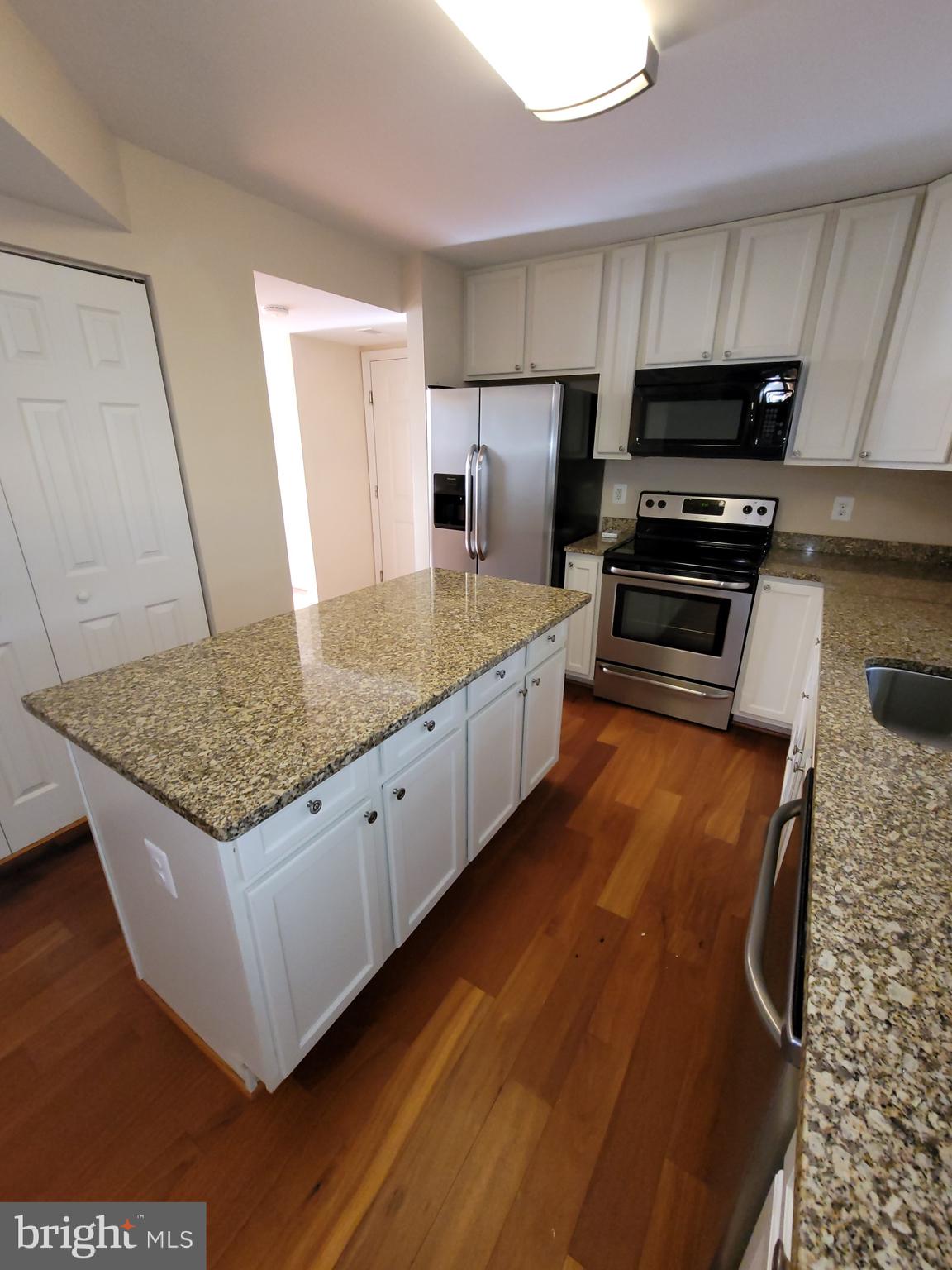 141 Jefferson Road Waldorf, MD 20602 - Photo 11 of 37 a kitchen with stainless steel appliances granite countertop a stove a sink and a refrigerator