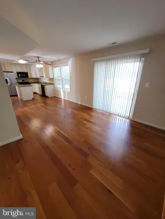 a view of living room with furniture and window