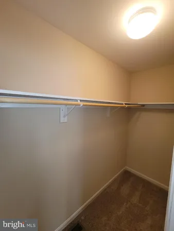 a view of small space with racks on the wall