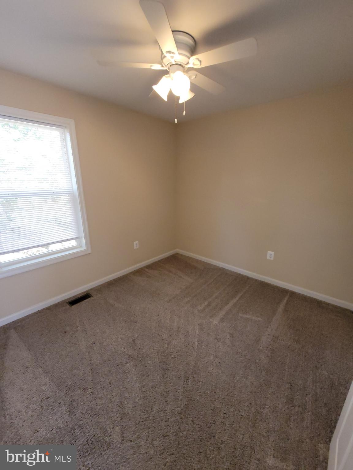 141 Jefferson Road Waldorf, MD 20602 - Photo 30 of 37 an empty room with windows and fan