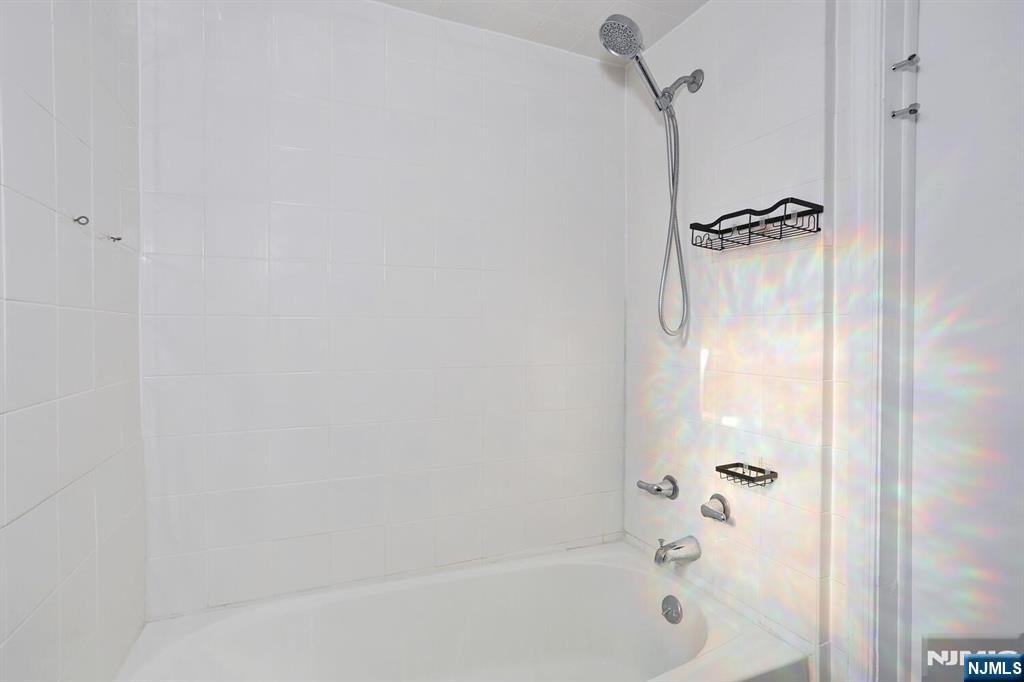 31 Madison Avenue Demarest, NJ 07627 - Photo 15 of 29 a bathroom with a shower