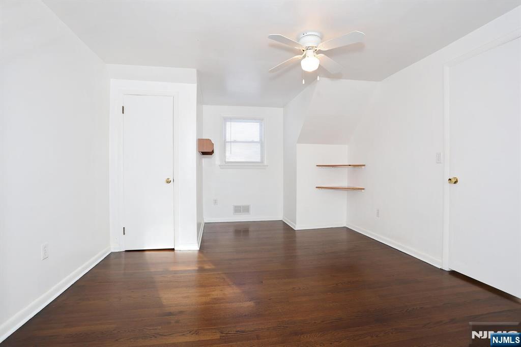 31 Madison Avenue Demarest, NJ 07627 - Photo 29 of 50 an empty room with closet and a ceiling fan