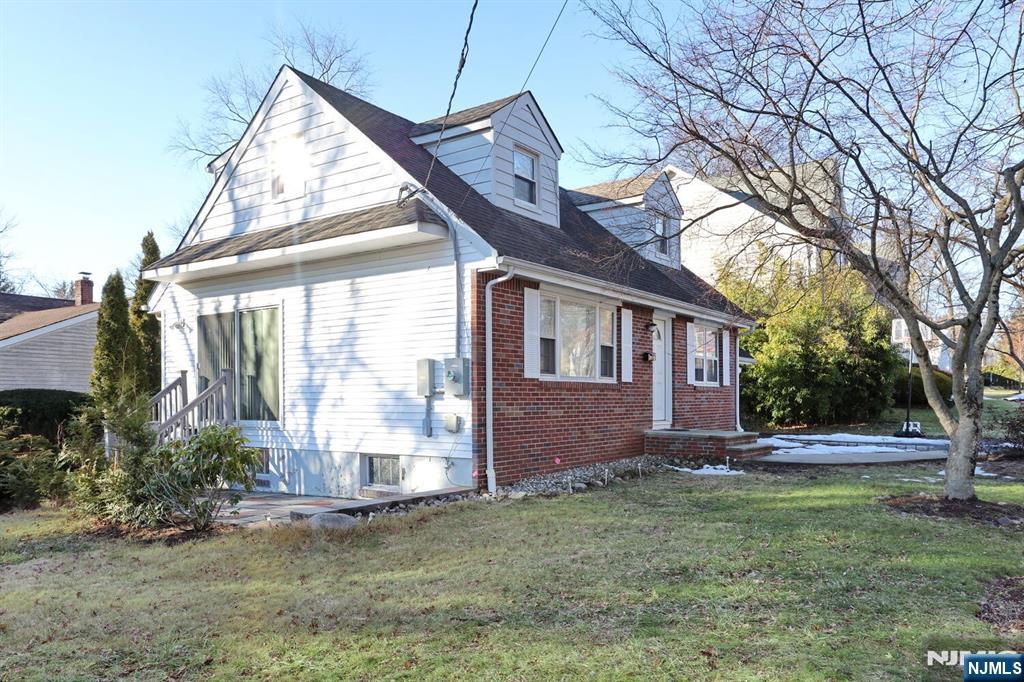 31 Madison Avenue Demarest, NJ 07627 - Photo 40 of 50 a front view of house with yard and green space