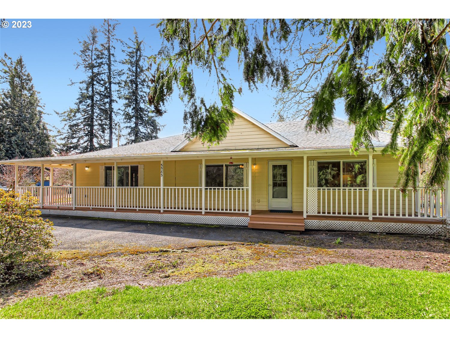 5585 Southwest River Road Hillsboro, OR 97123 - Photo 1 of 29 a front view of a house with a yard