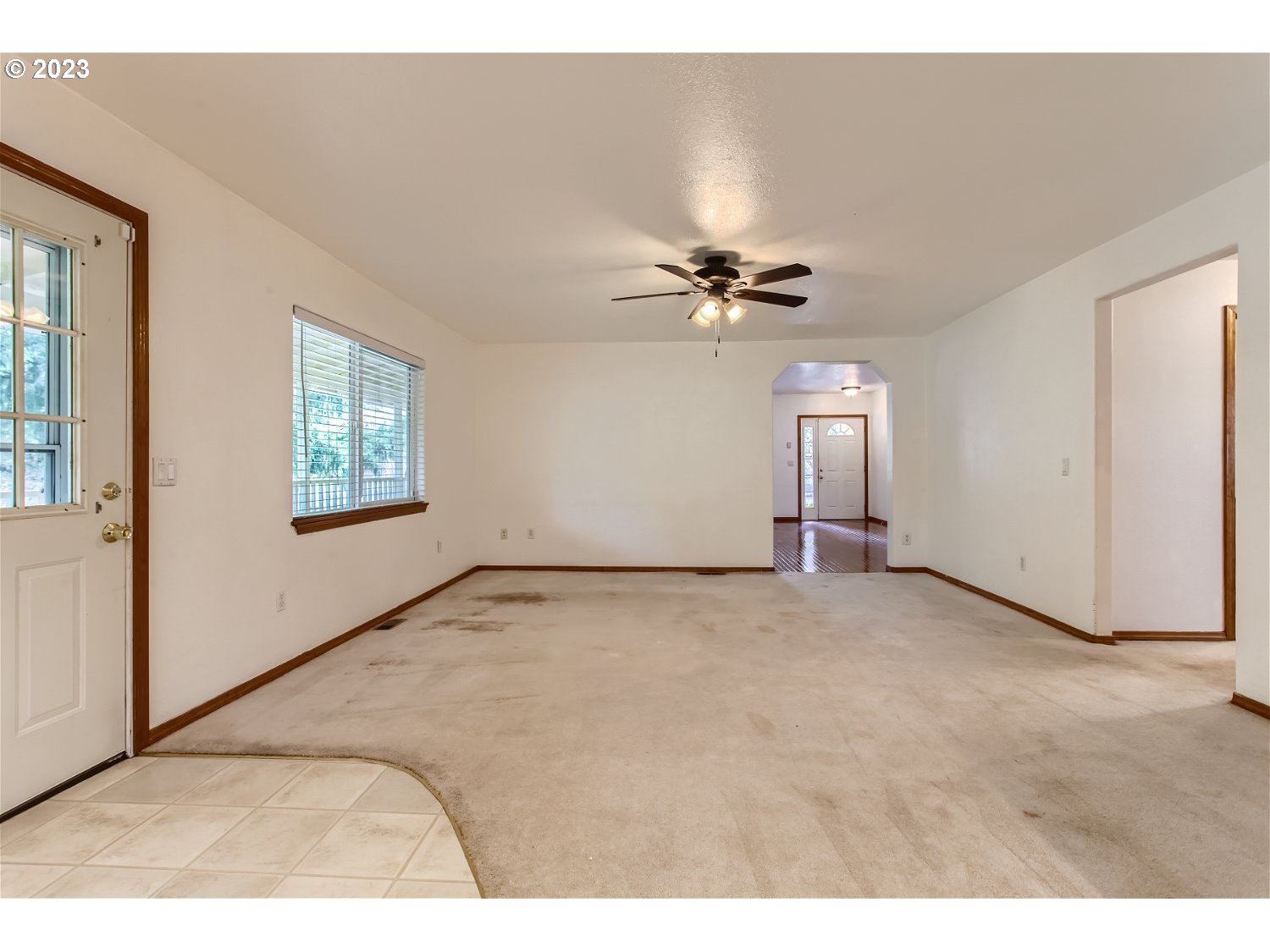 5585 Southwest River Road Hillsboro, OR 97123 - Photo 12 of 29 a view of an empty room with a window