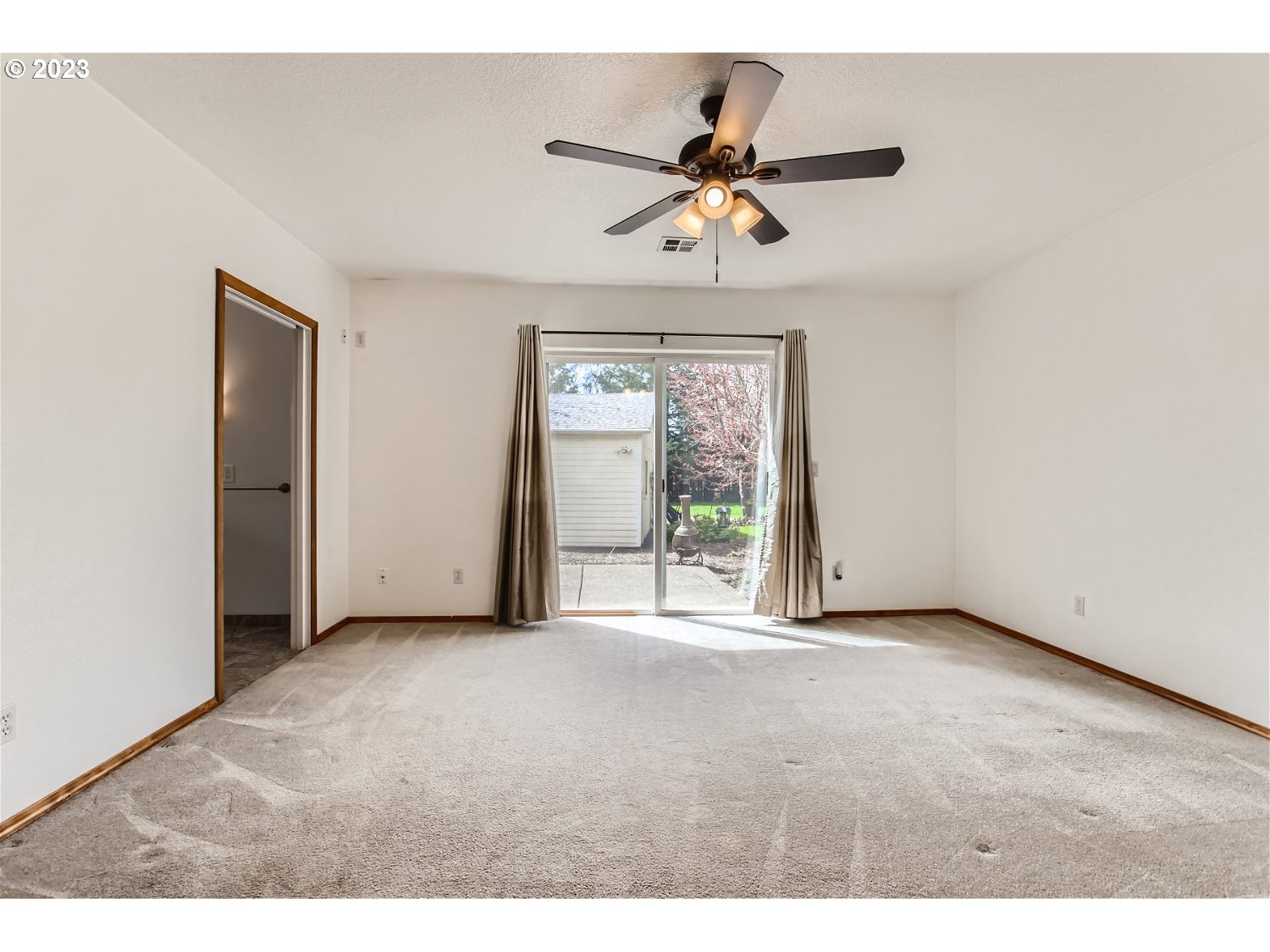 5585 Southwest River Road Hillsboro, OR 97123 - Photo 16 of 29 a view of an empty room with a window