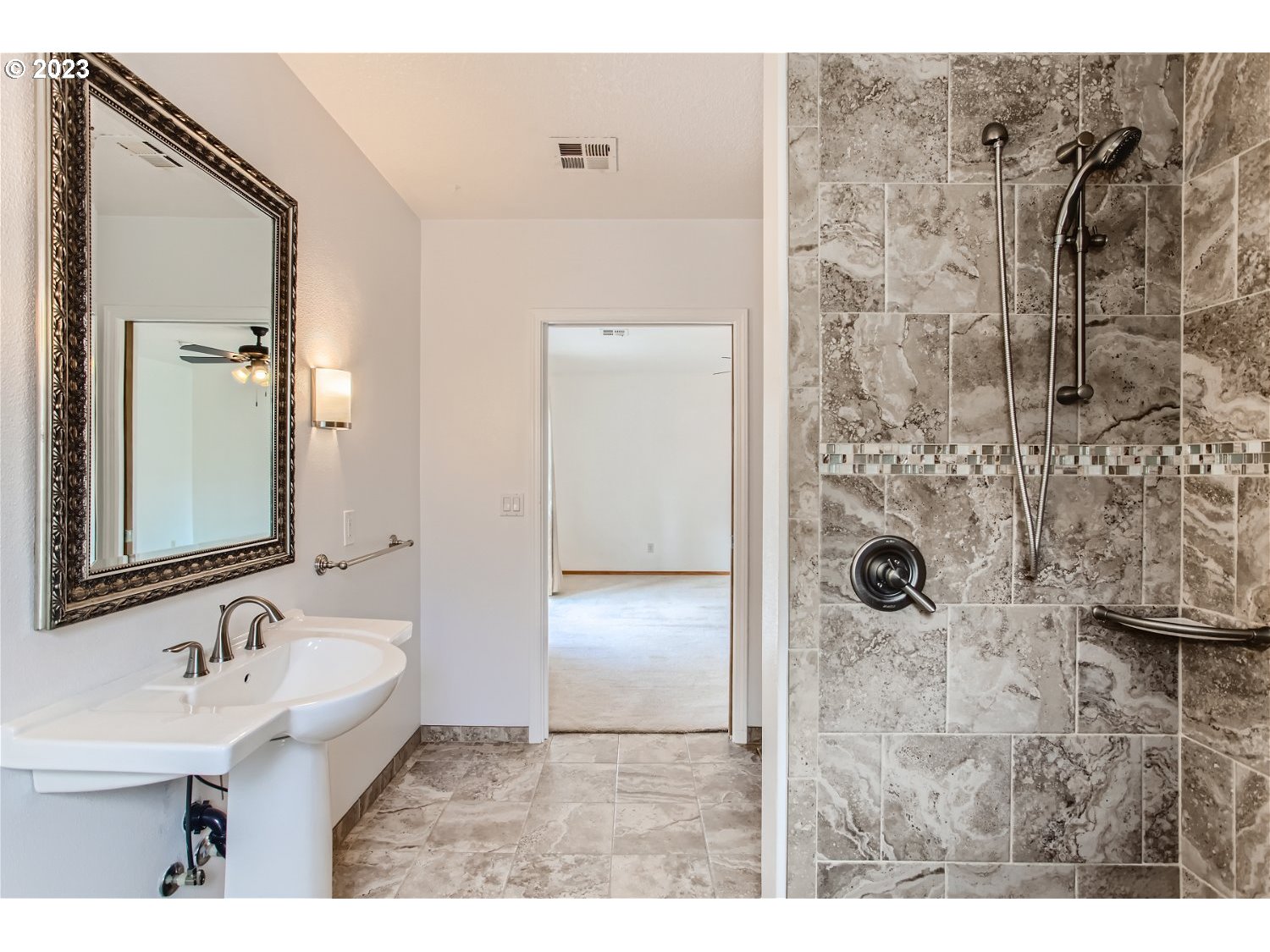 5585 Southwest River Road Hillsboro, OR 97123 - Photo 20 of 29 a bathroom with a sink and mirror