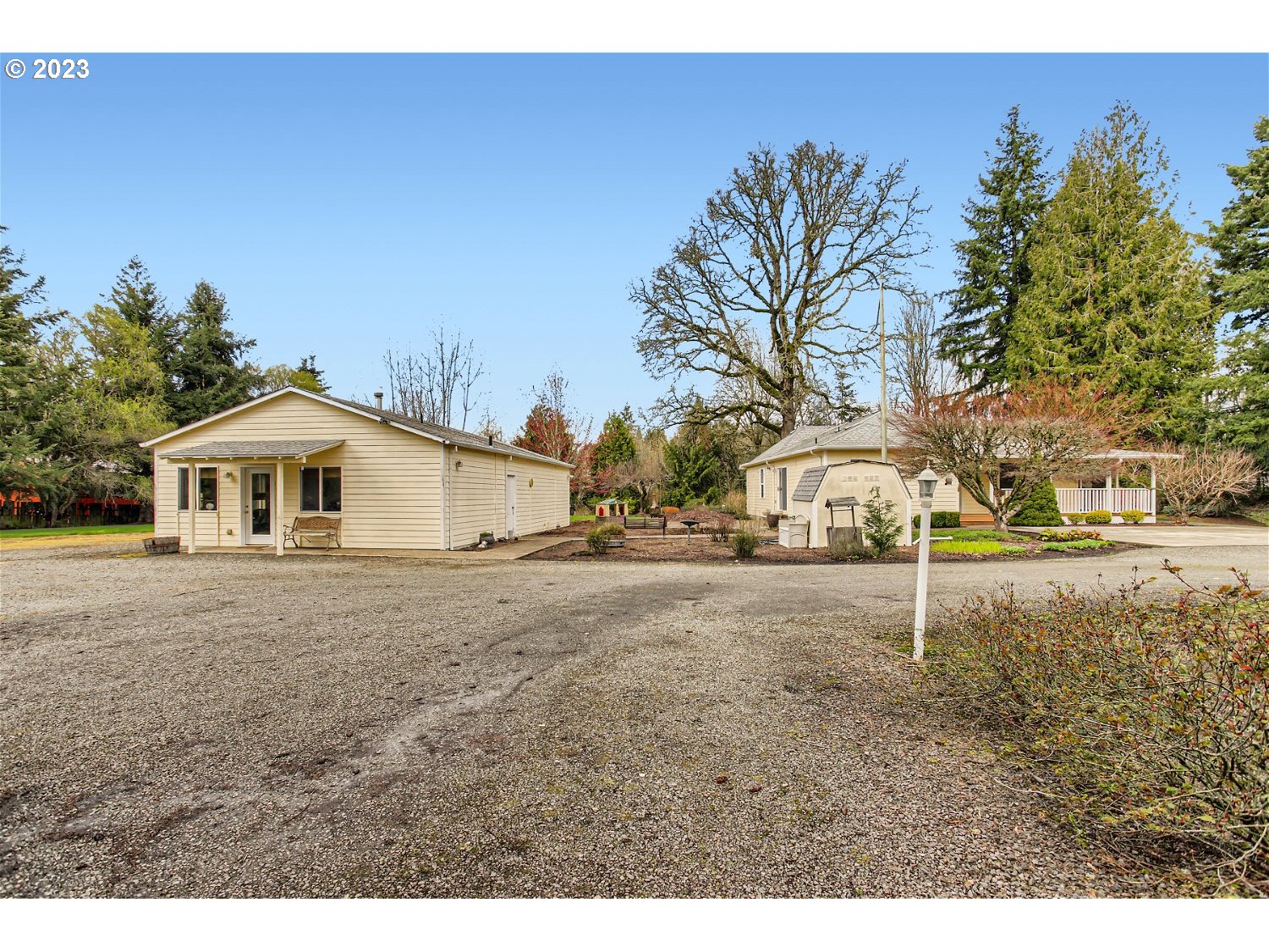 5585 Southwest River Road Hillsboro, OR 97123 - Photo 2 of 29 a view of a town with barn house