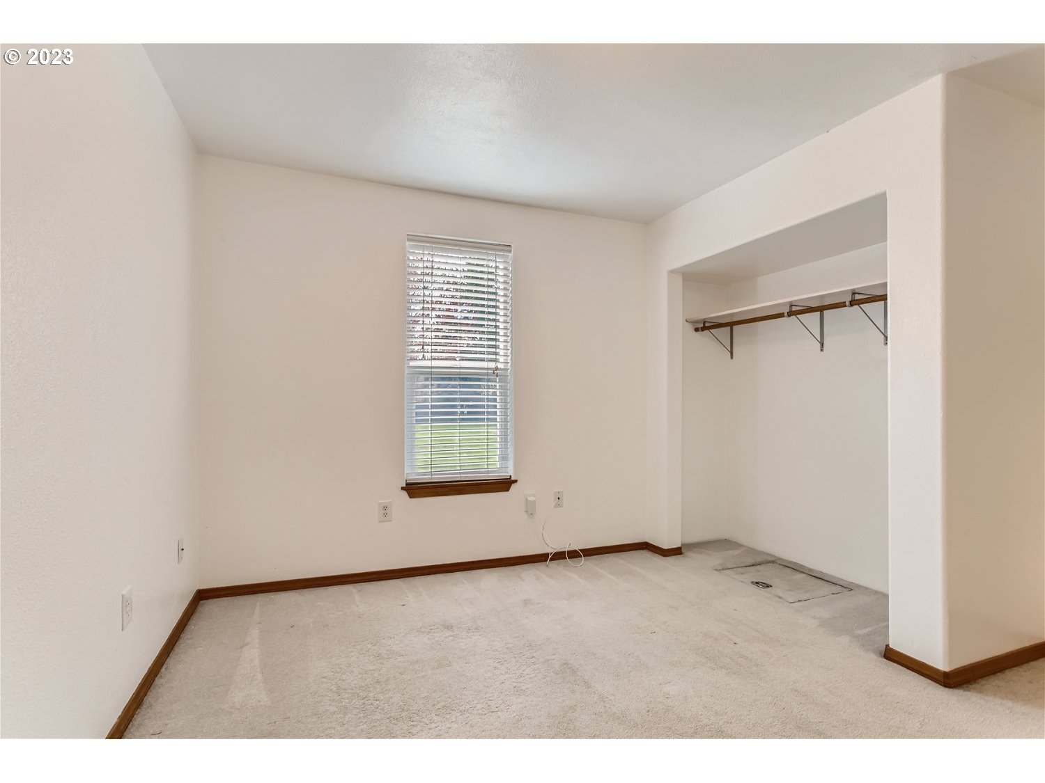 5585 Southwest River Road Hillsboro, OR 97123 - Photo 21 of 29 a view of an empty room with a window