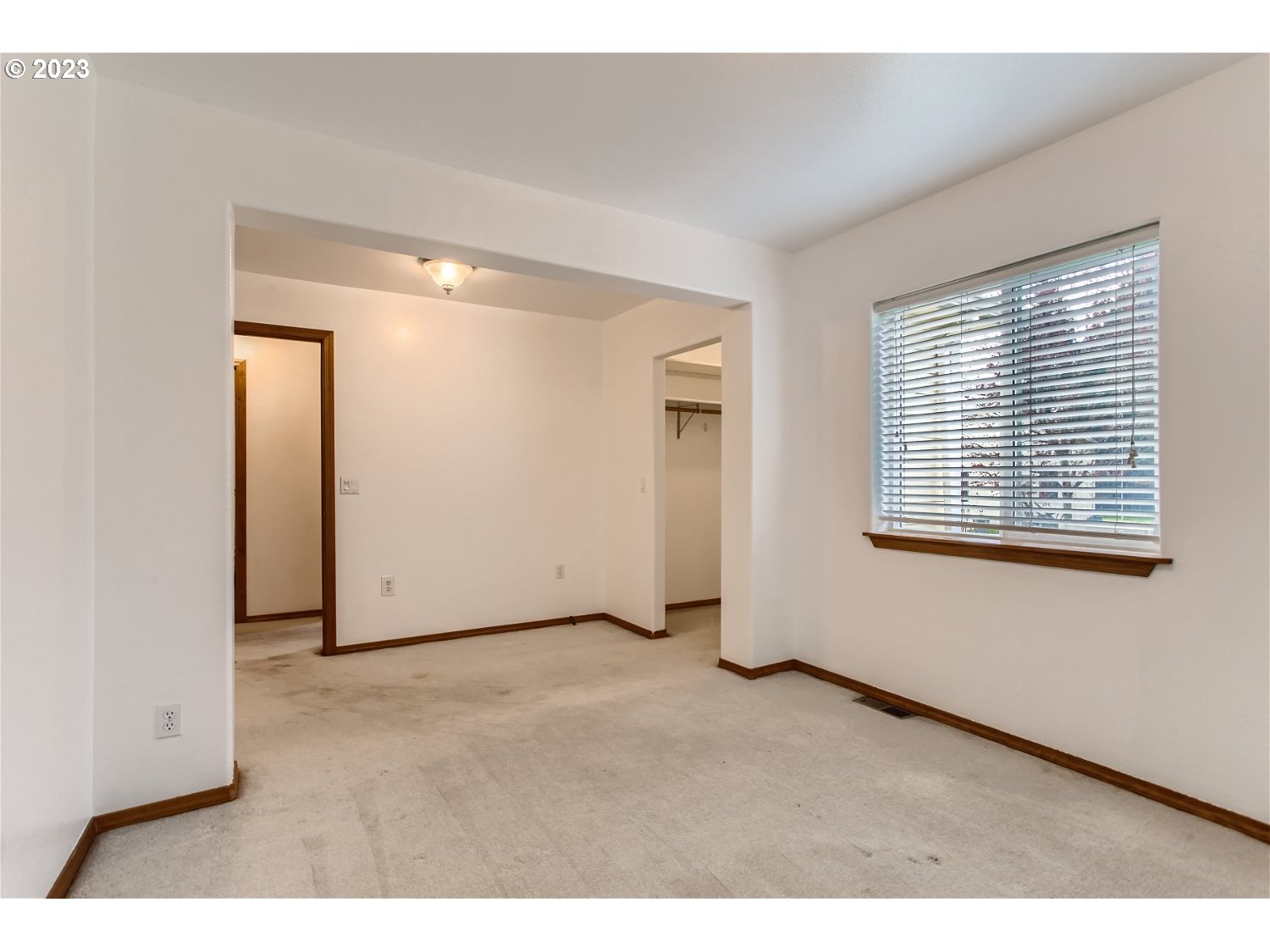 5585 Southwest River Road Hillsboro, OR 97123 - Photo 23 of 29 a view of an empty room with a window
