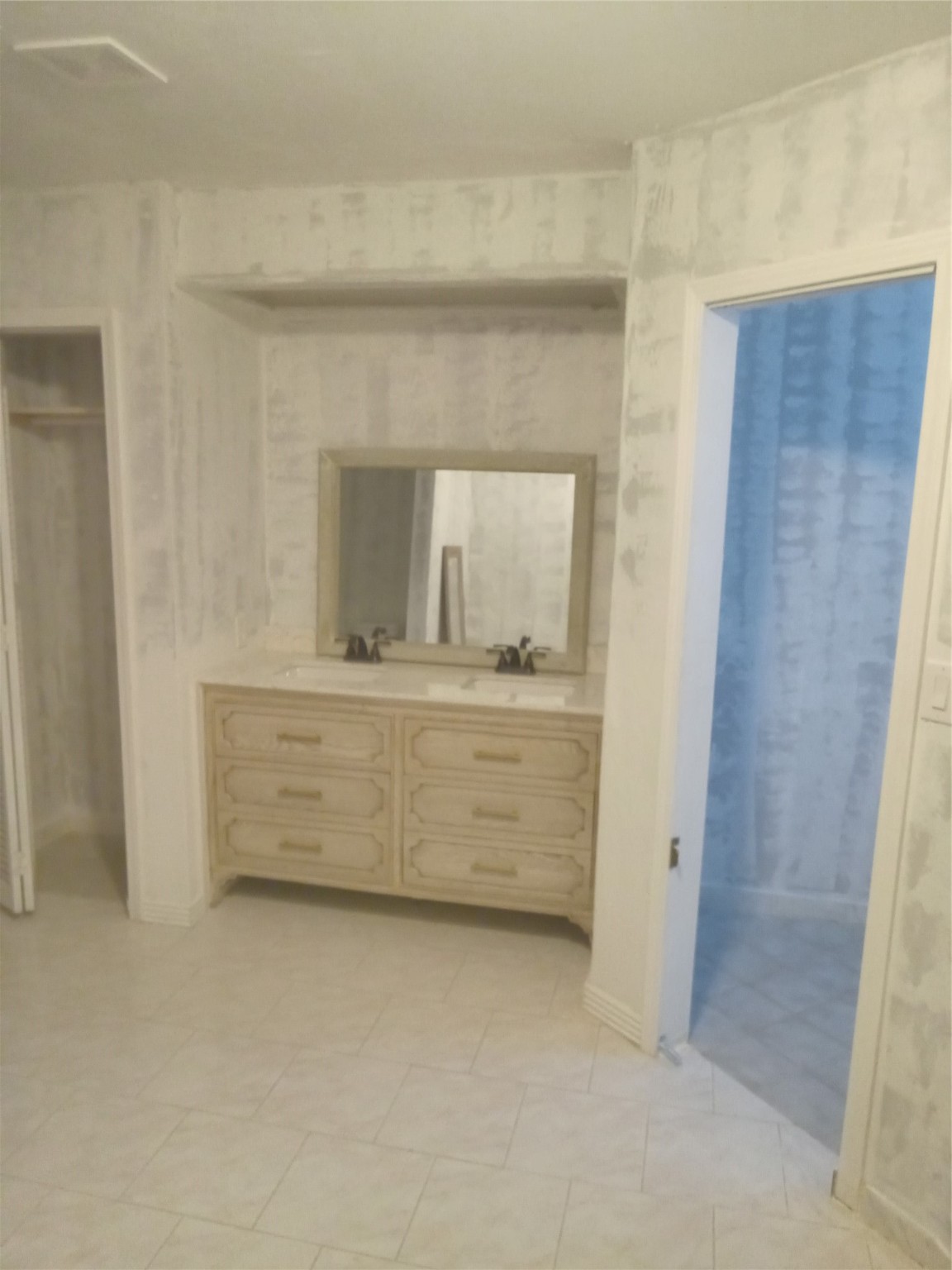 15910 Hartman Road Magnolia, TX 77355 - Photo 12 of 25 a bathroom with a mirror sink and vanity