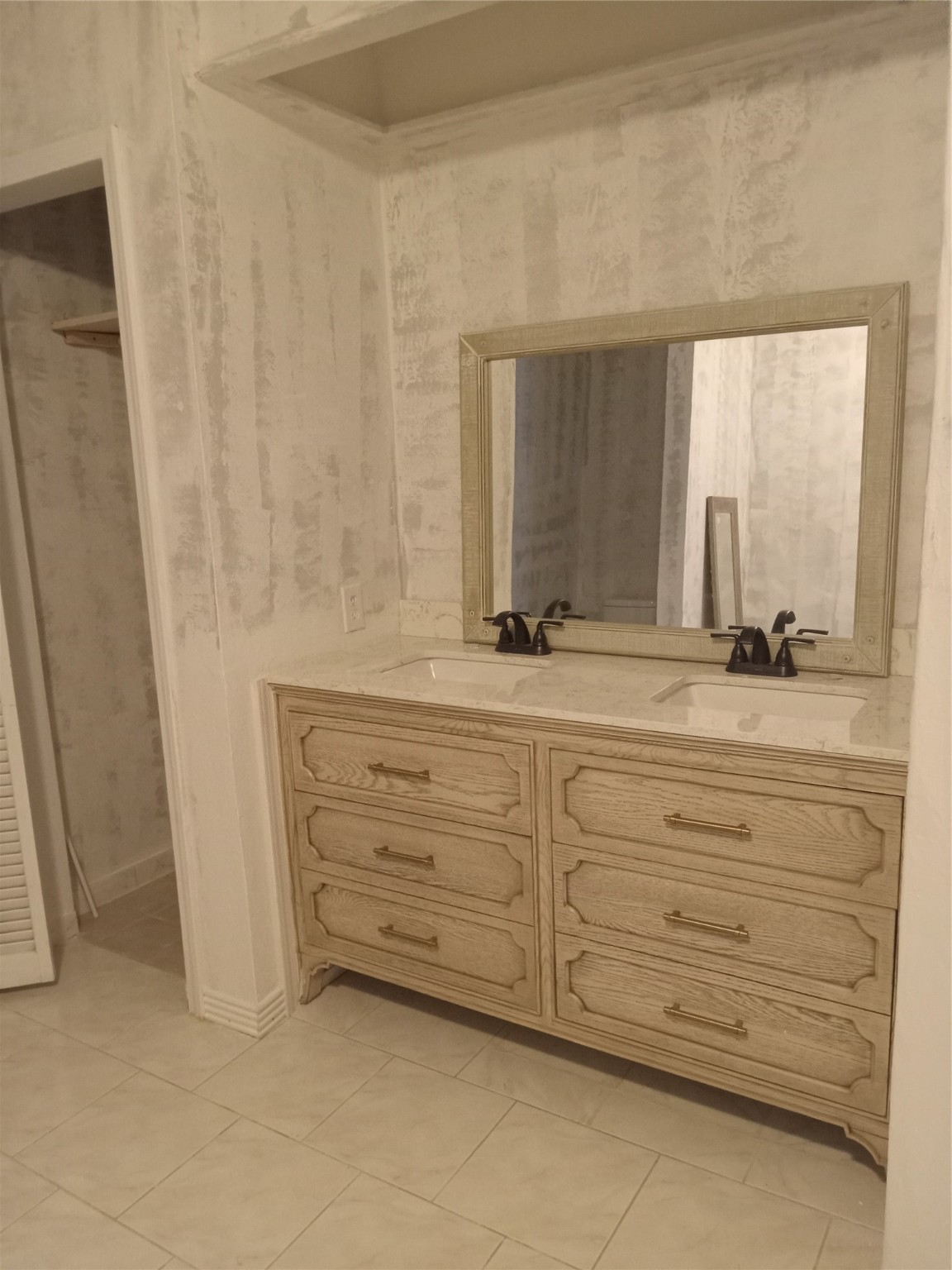 15910 Hartman Road Magnolia, TX 77355 - Photo 13 of 25 a bathroom with a sink and a mirror