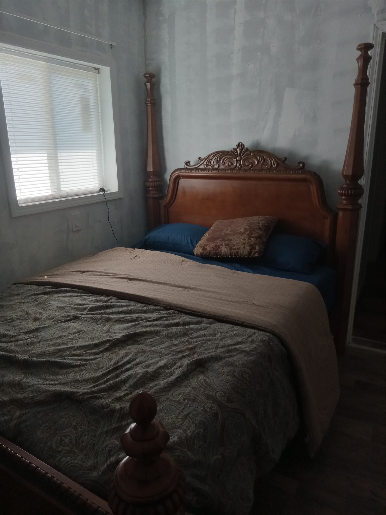 15910 Hartman Road Magnolia, TX 77355 - Photo 15 of 25 a bedroom with a bed and a window