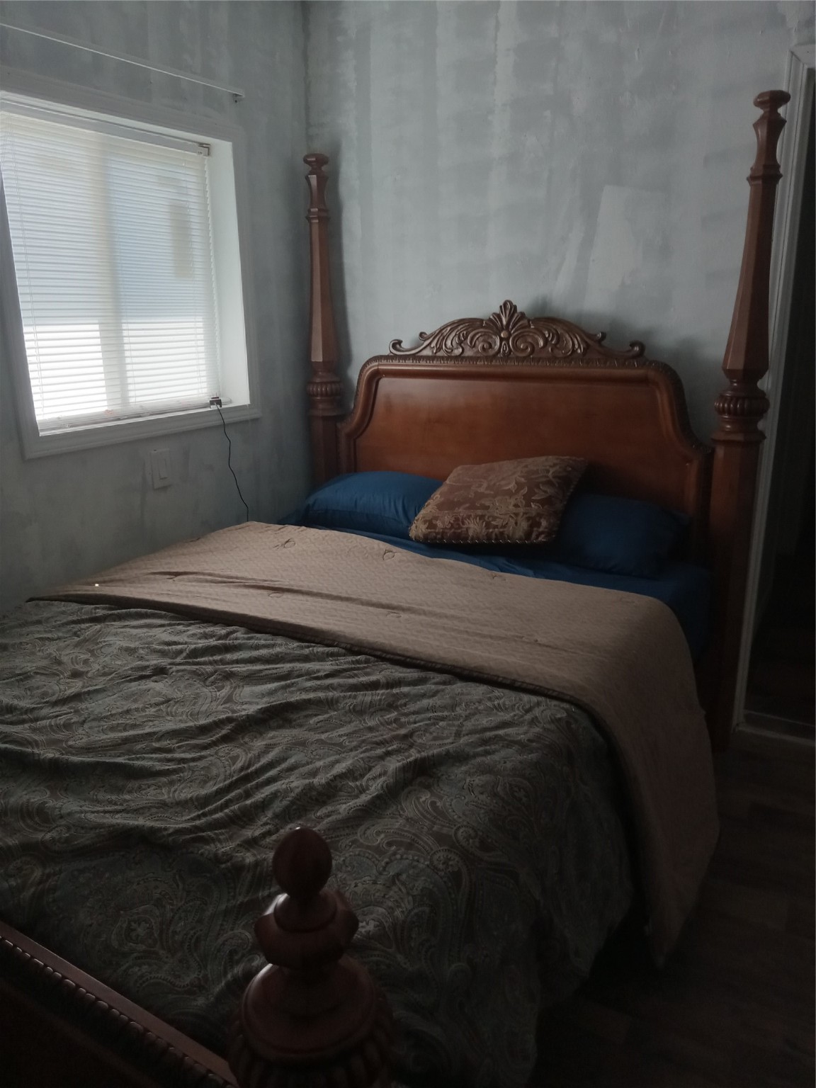 15910 Hartman Road Magnolia, TX 77355 - Photo 15 of 25 a bedroom with a bed and a window
