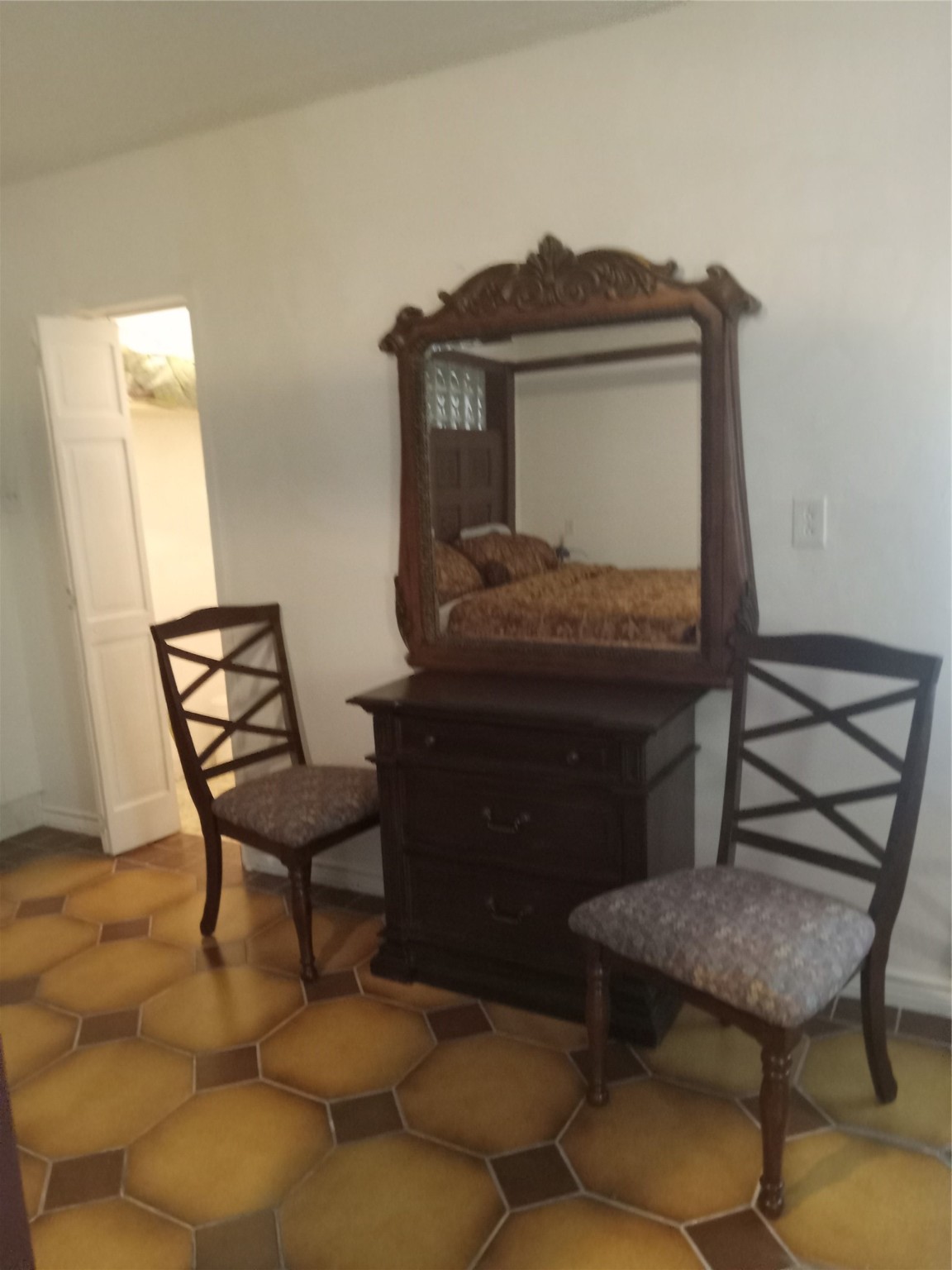 15910 Hartman Road Magnolia, TX 77355 - Photo 18 of 25 a living room with furniture and a dresser