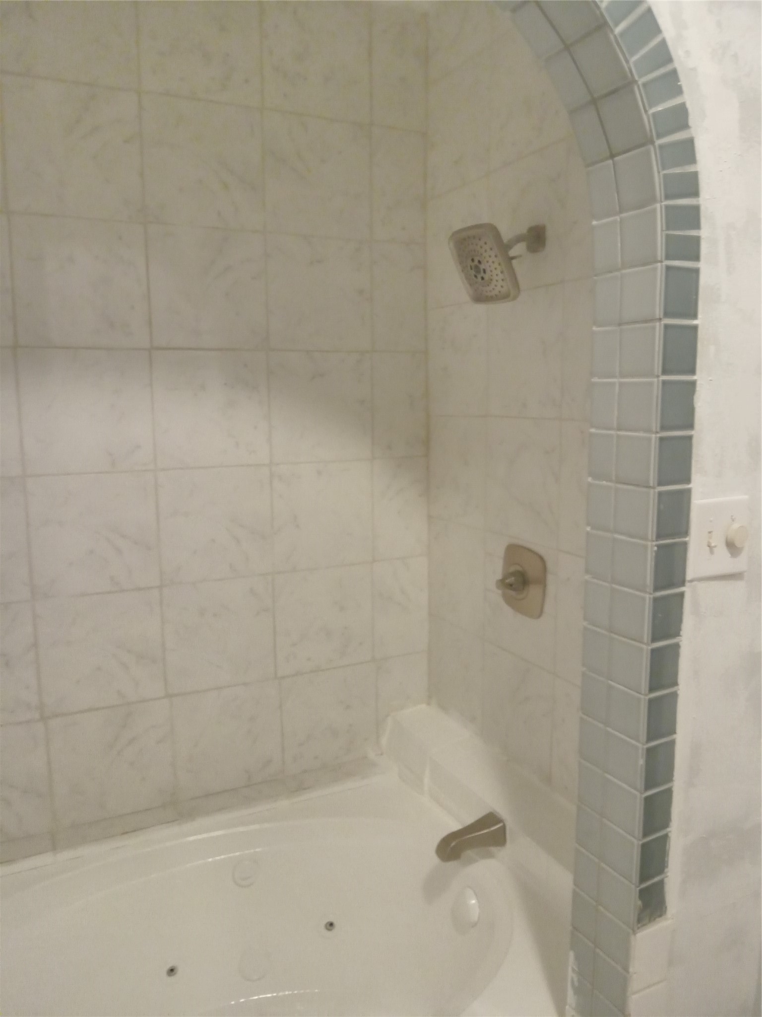 15910 Hartman Road Magnolia, TX 77355 - Photo 10 of 25 a bathroom with a shower and a bathtub