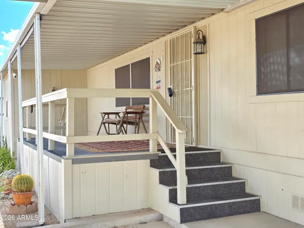a view of entryway with a front door