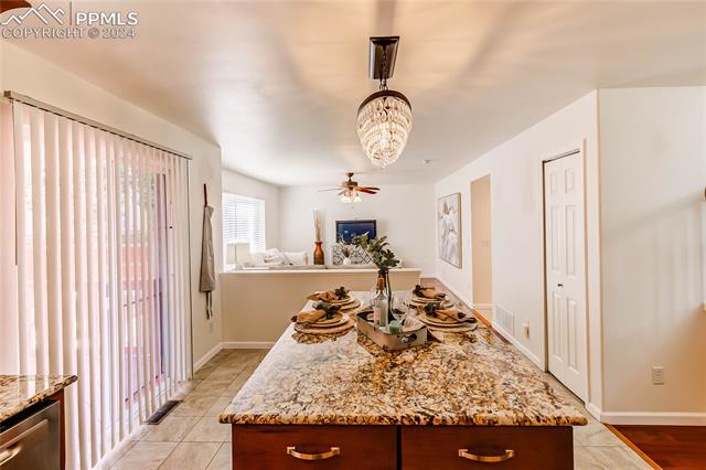 7534 Old Spec Road Peyton, CO 80831 - Photo 12 of 45 Great granite island and countertops.