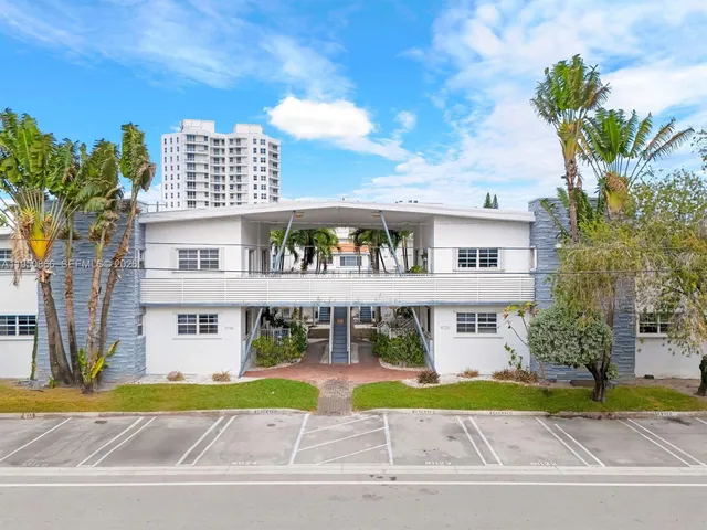 a view of a building with a street