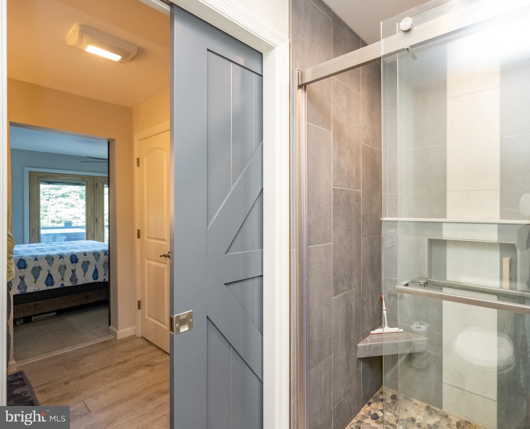 1488 Marsh Hill Road McHenry, MD 21541 - Photo 31 of 64 a bathroom with a sink and a mirror