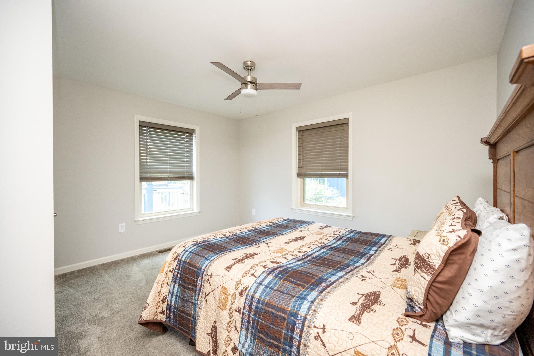 1488 Marsh Hill Road McHenry, MD 21541 - Photo 32 of 64 a bedroom with a bed and a window