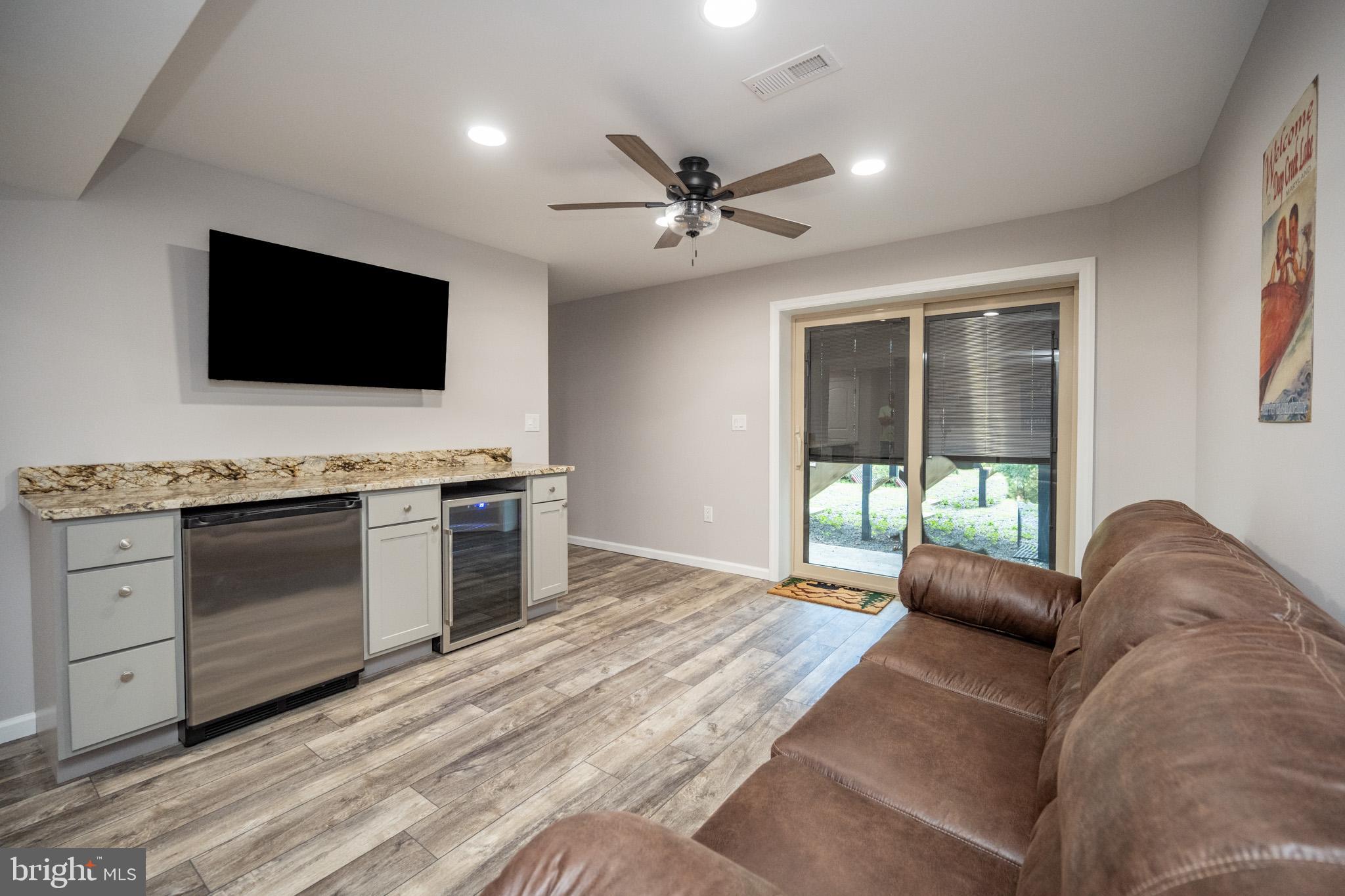 1488 Marsh Hill Road McHenry, MD 21541 - Photo 44 of 64 a living room with furniture and a flat screen tv