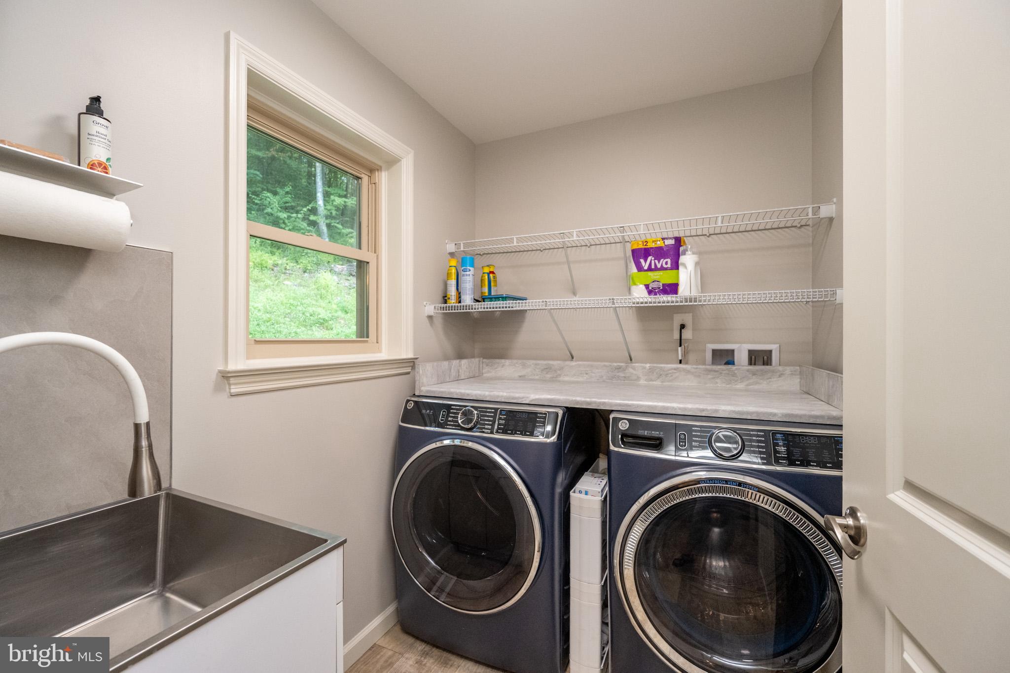 1488 Marsh Hill Road McHenry, MD 21541 - Photo 48 of 64 a utility room with dryer and washer