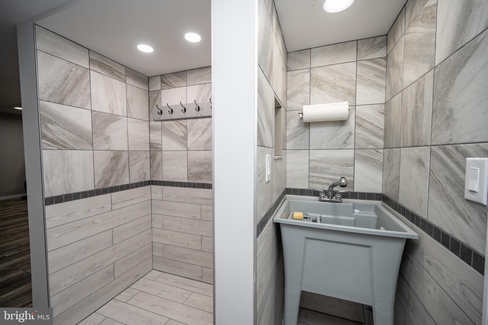 1488 Marsh Hill Road McHenry, MD 21541 - Photo 54 of 64 a bathroom with a sink and shower