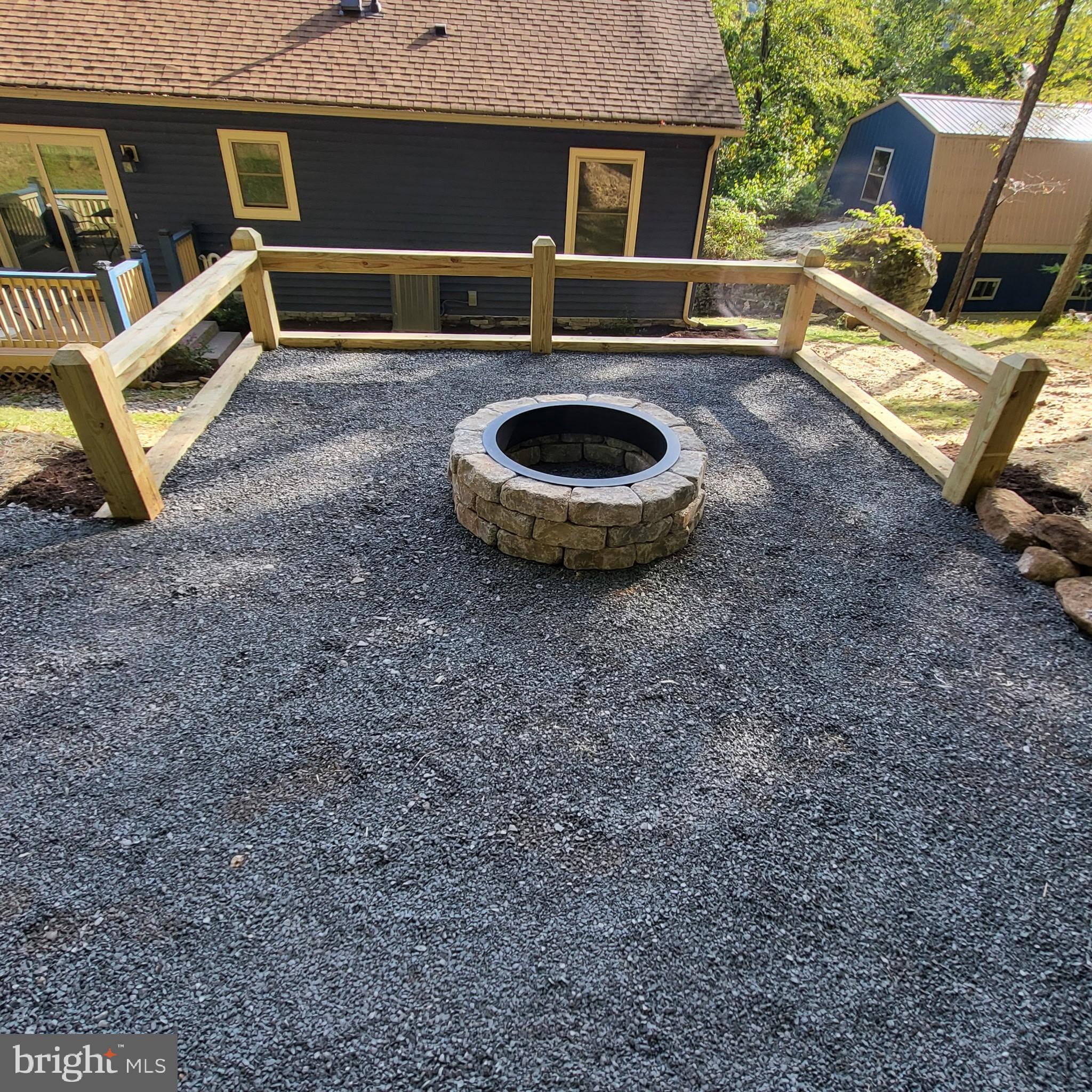 1488 Marsh Hill Road McHenry, MD 21541 - Photo 62 of 64 a backyard of a house with yard and garage