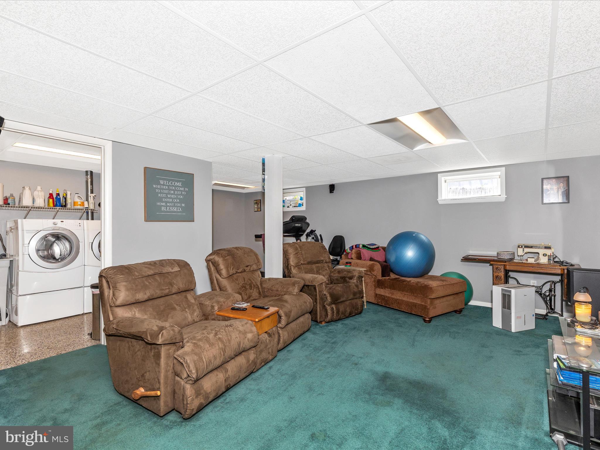 3101 Buffalo Road New Windsor, MD 21776 - Photo 33 of 53 a living room with furniture and a chair
