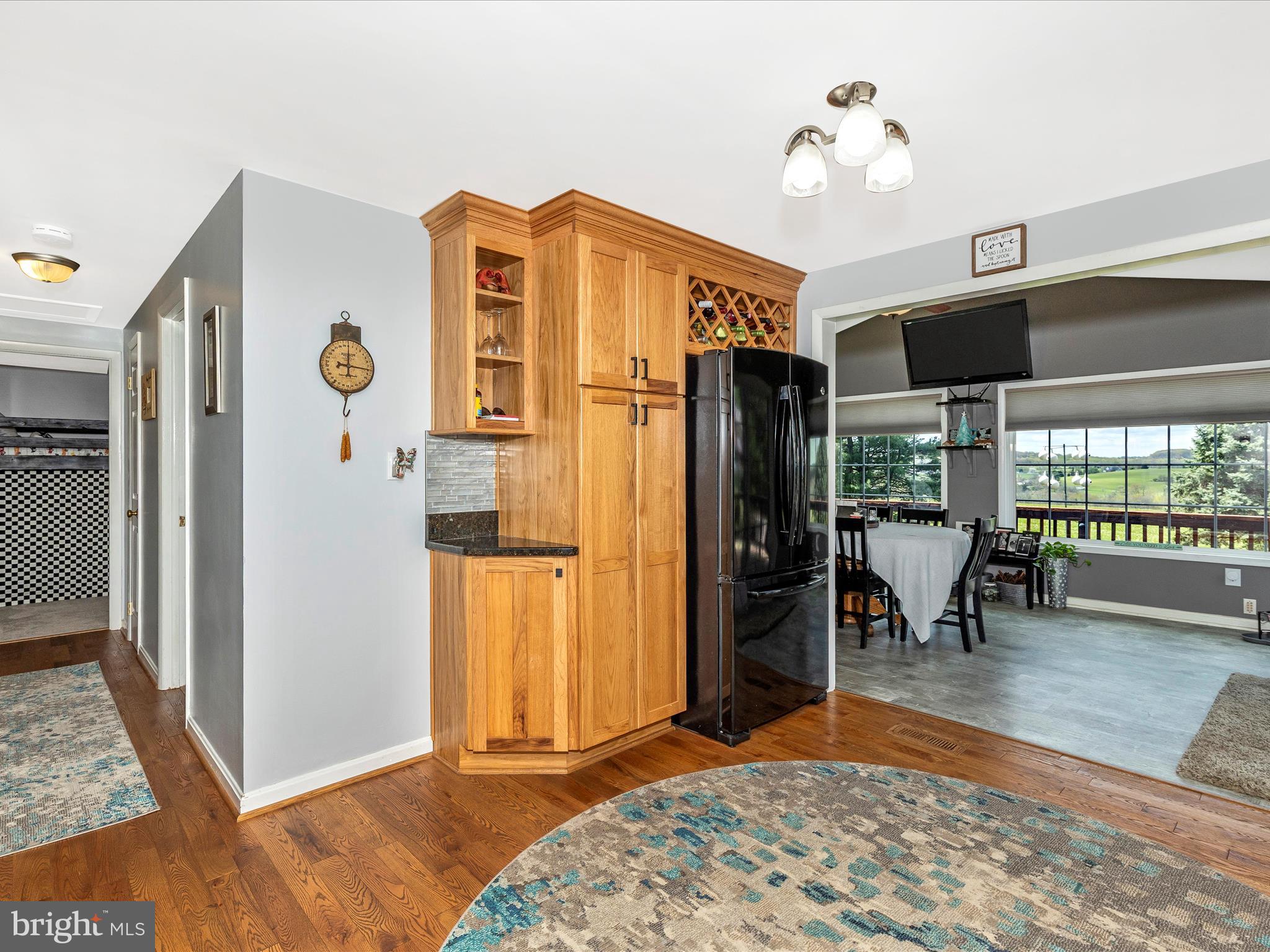 3101 Buffalo Road New Windsor, MD 21776 - Photo 8 of 53 a very nice looking room with a large window and a chandelier