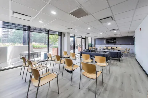 a very nice looking living room with a large window