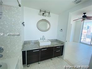 185 Southwest 7th Street, Unit 3502 Miami, FL 33130 - Photo 11 of 15 a view of a balcony with furniture