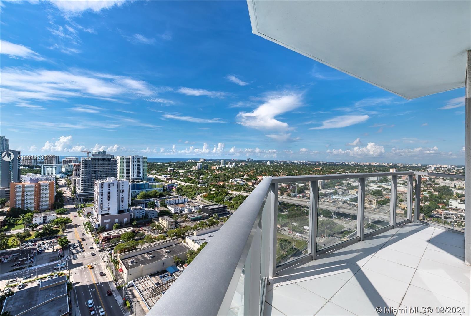 185 Southwest 7th Street, Unit 3502 Miami, FL 33130 - Photo 4 of 15 a view of a balcony with city