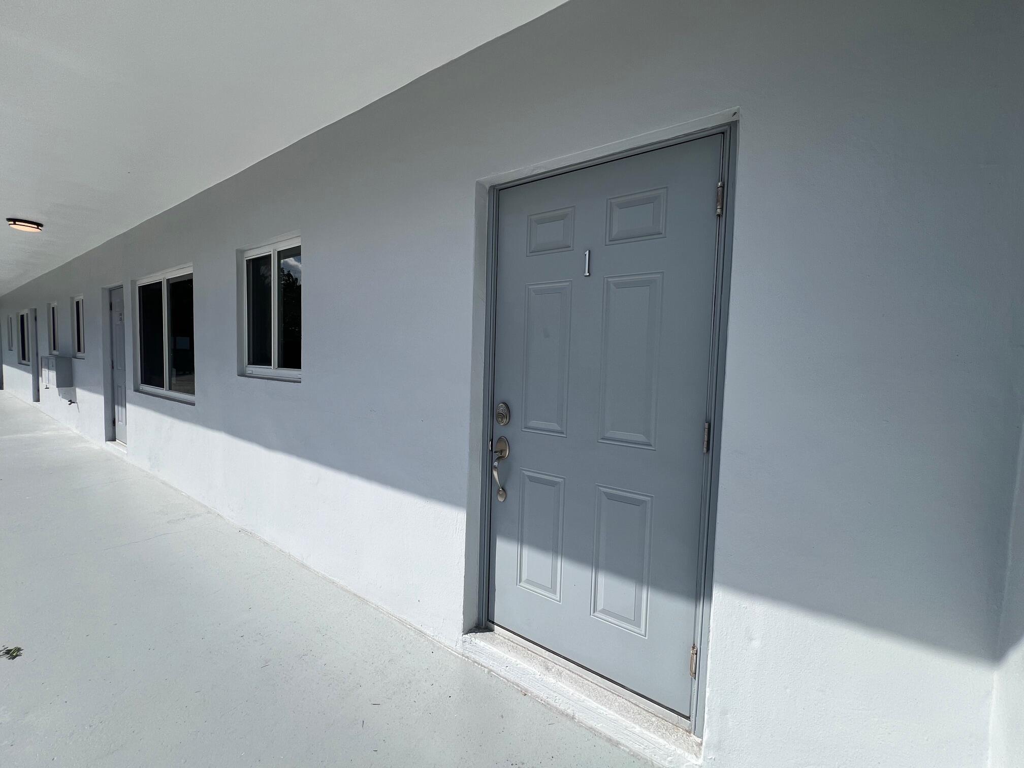 206 Southeast 1st Avenue, Unit 1 Delray Beach, FL 33444 - Photo 10 of 11 a view of a hallway with entryway