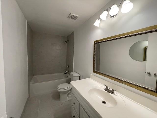 56 Wooded Court Calverton, NY 11933 - Photo 5 of 10 a bathroom with a sink a toilet and a mirror