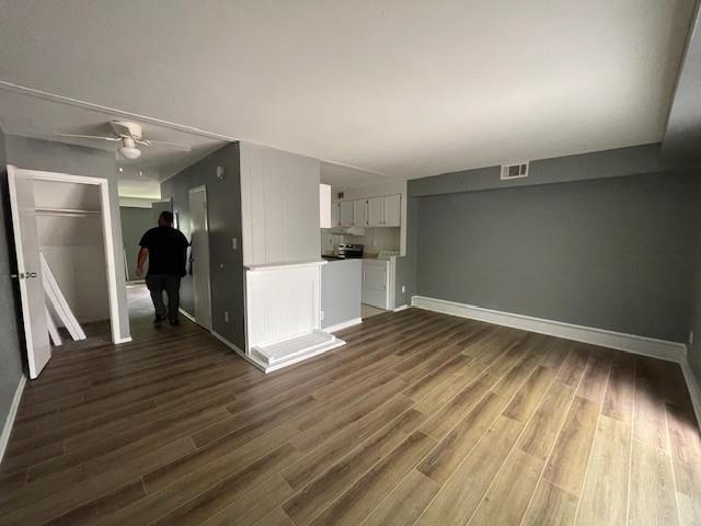 56 Wooded Court Calverton, NY 11933 - Photo 10 of 10 a view of a room with wooden floor and stairs