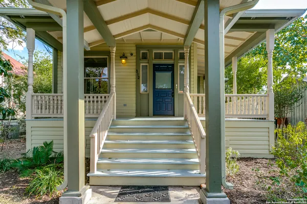 a front view of a house with a porch