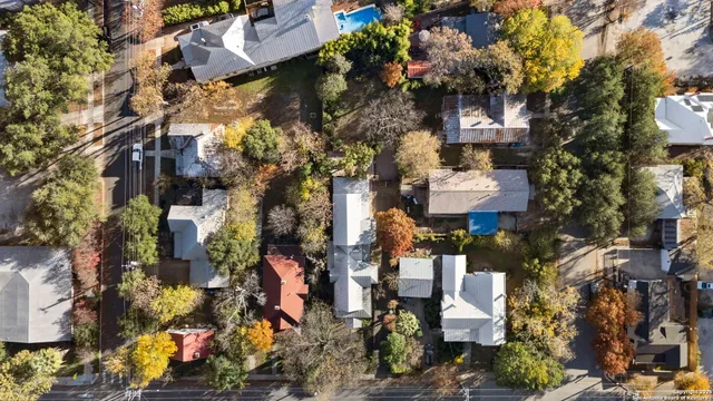 a backyard of a house with outdoor seating