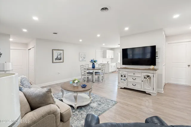 a living room with furniture and a couch
