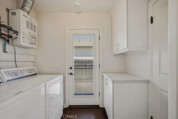 a bathroom with a sink a mirror and vanity