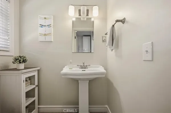 a bathroom with a shower and a mirror