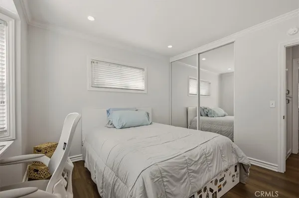 a spacious bathroom with a sink a mirror and a shower