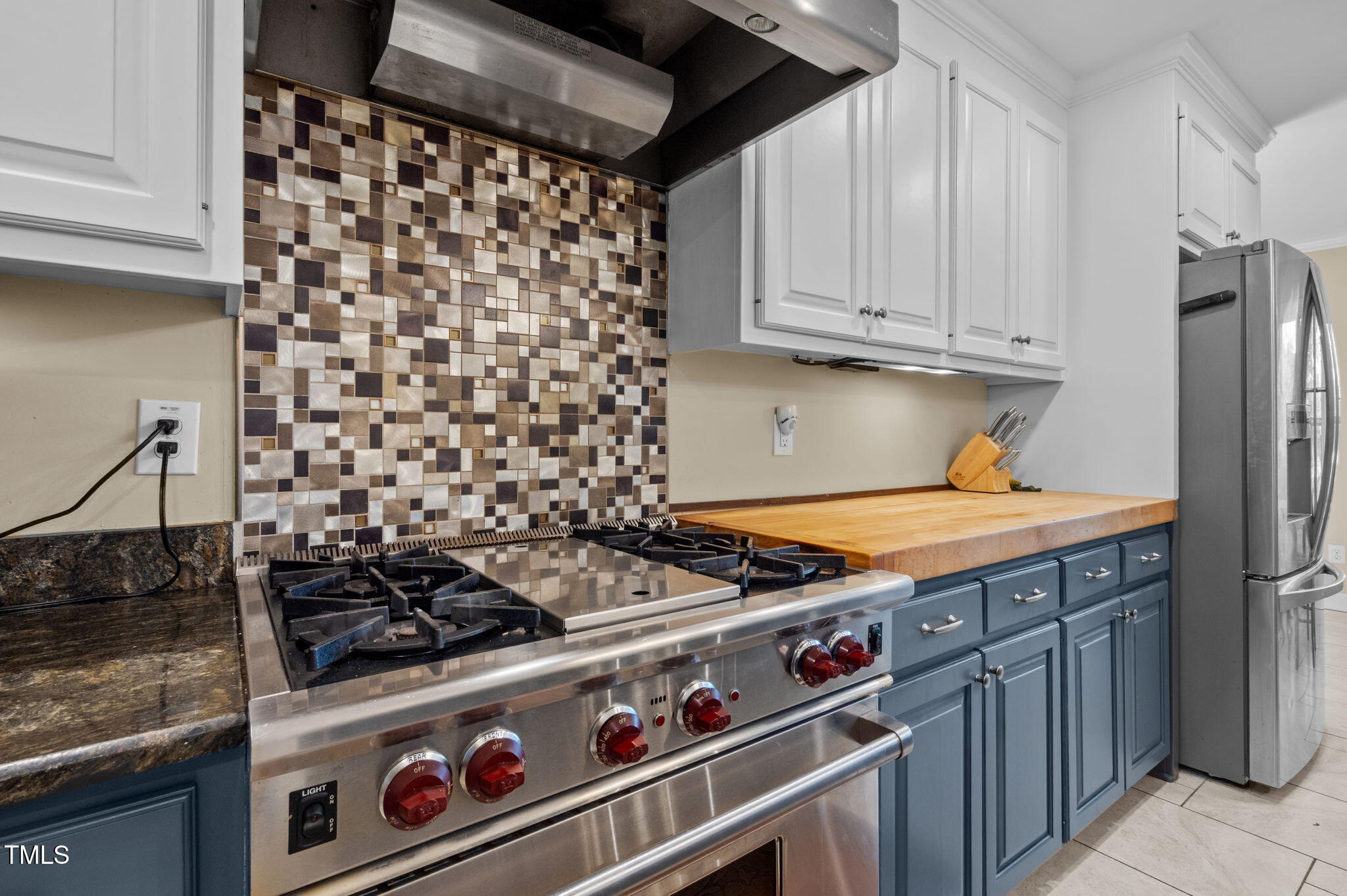 4811 New Sharon Church Road Hillsborough, NC 27278 - Photo 27 of 84 a stove top oven sitting inside of a kitchen