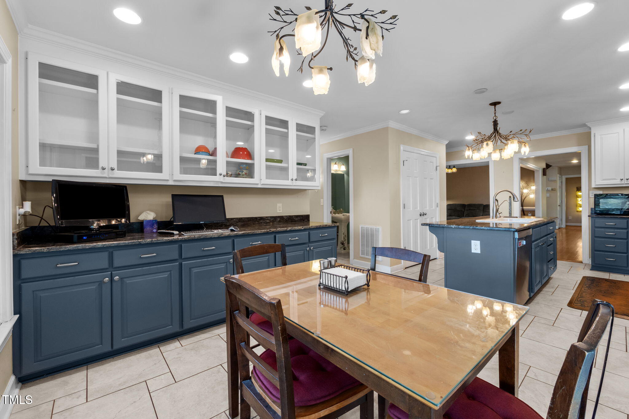 4811 New Sharon Church Road Hillsborough, NC 27278 - Photo 30 of 84 a view of a dining room with furniture and a chandelier