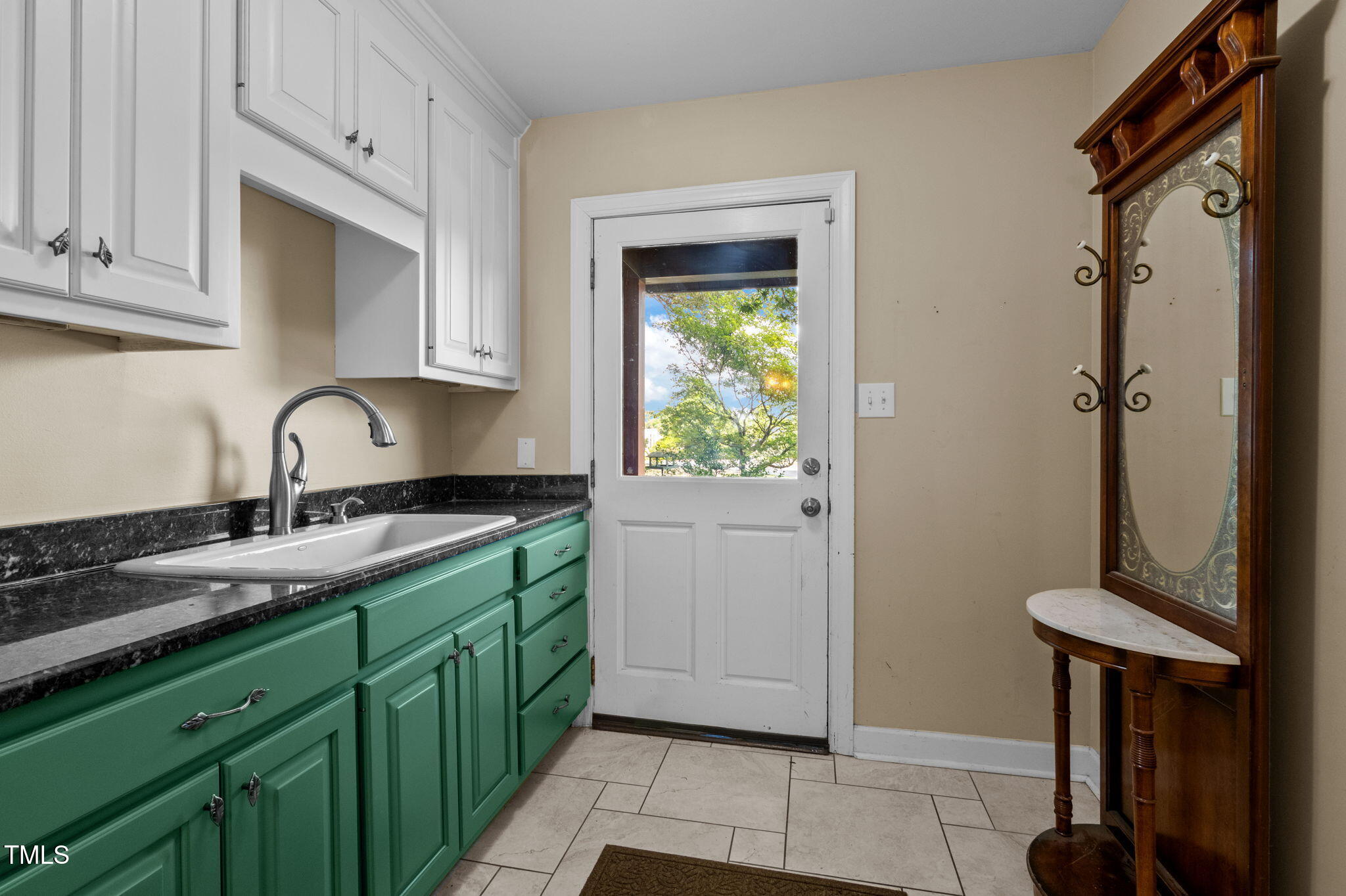 4811 New Sharon Church Road Hillsborough, NC 27278 - Photo 34 of 84 a kitchen with sink and cabinets