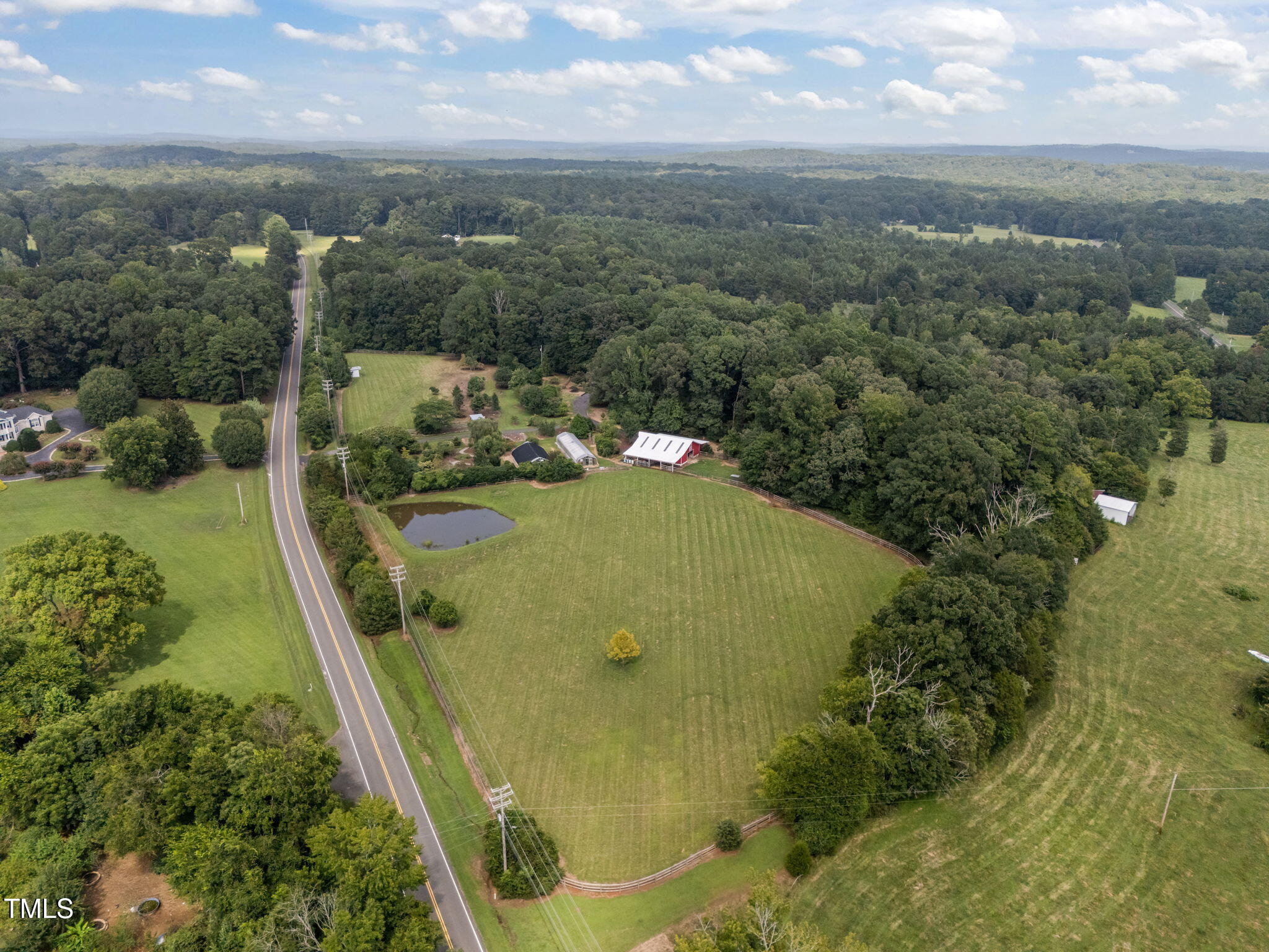 4811 New Sharon Church Road Hillsborough, NC 27278 - Photo 3 of 84 an aerial view of a residential houses with outdoor space and trees