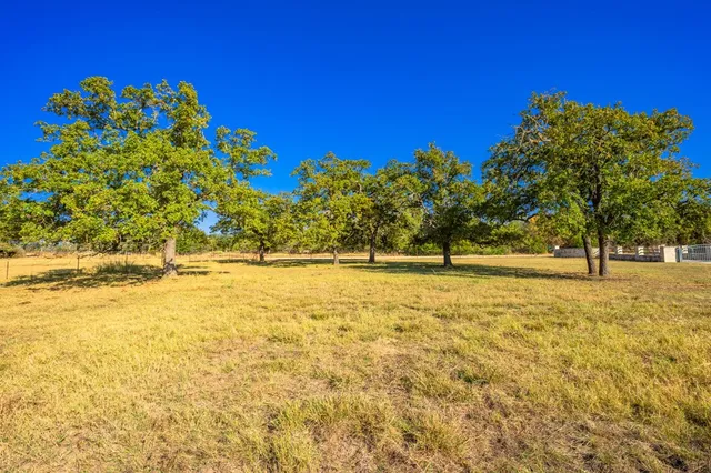 a view of swimming pool with an outdoor space and seating area